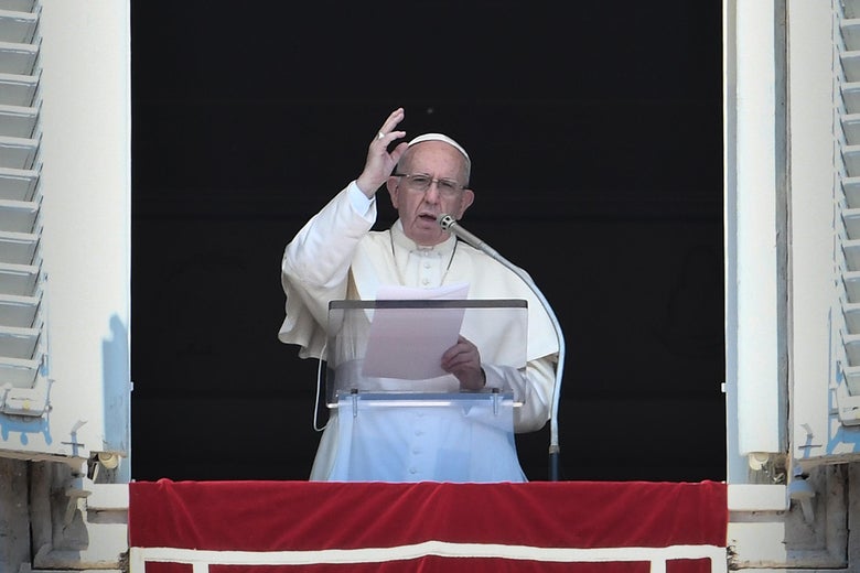 Pope Francis speaks from a window of the Apostolic Palace at St. Peter’s Square in the Vatican.